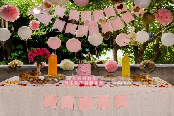 Elegant birthday cake with Happy Birthday text and candles